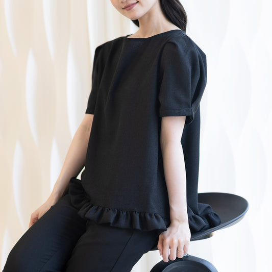 ふっくら裾フリルのツイードトップス